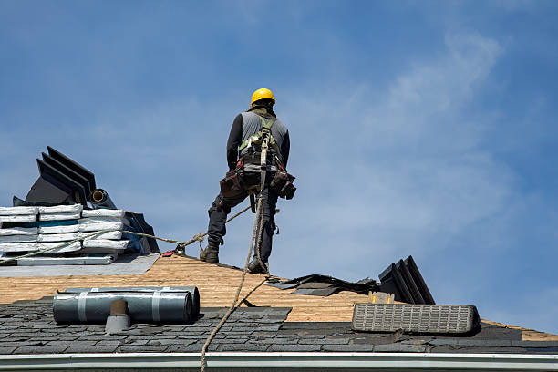Professional Storm Damage Roof Repair technician working in Fitchburg, WI